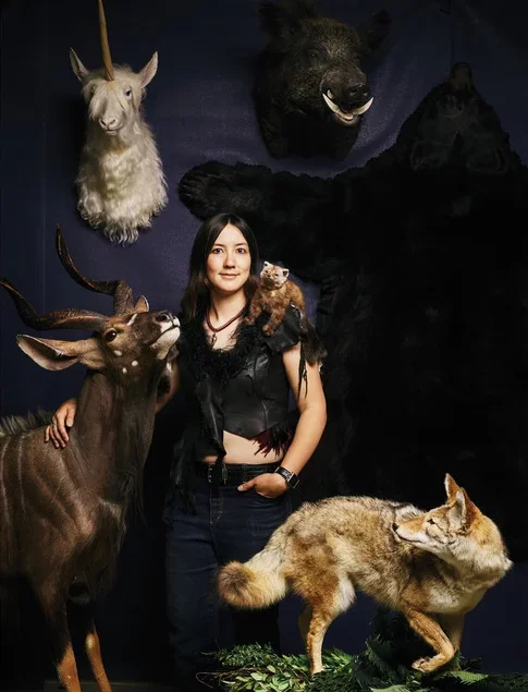 Lee Duckworth surrounded by some of her taxidermy